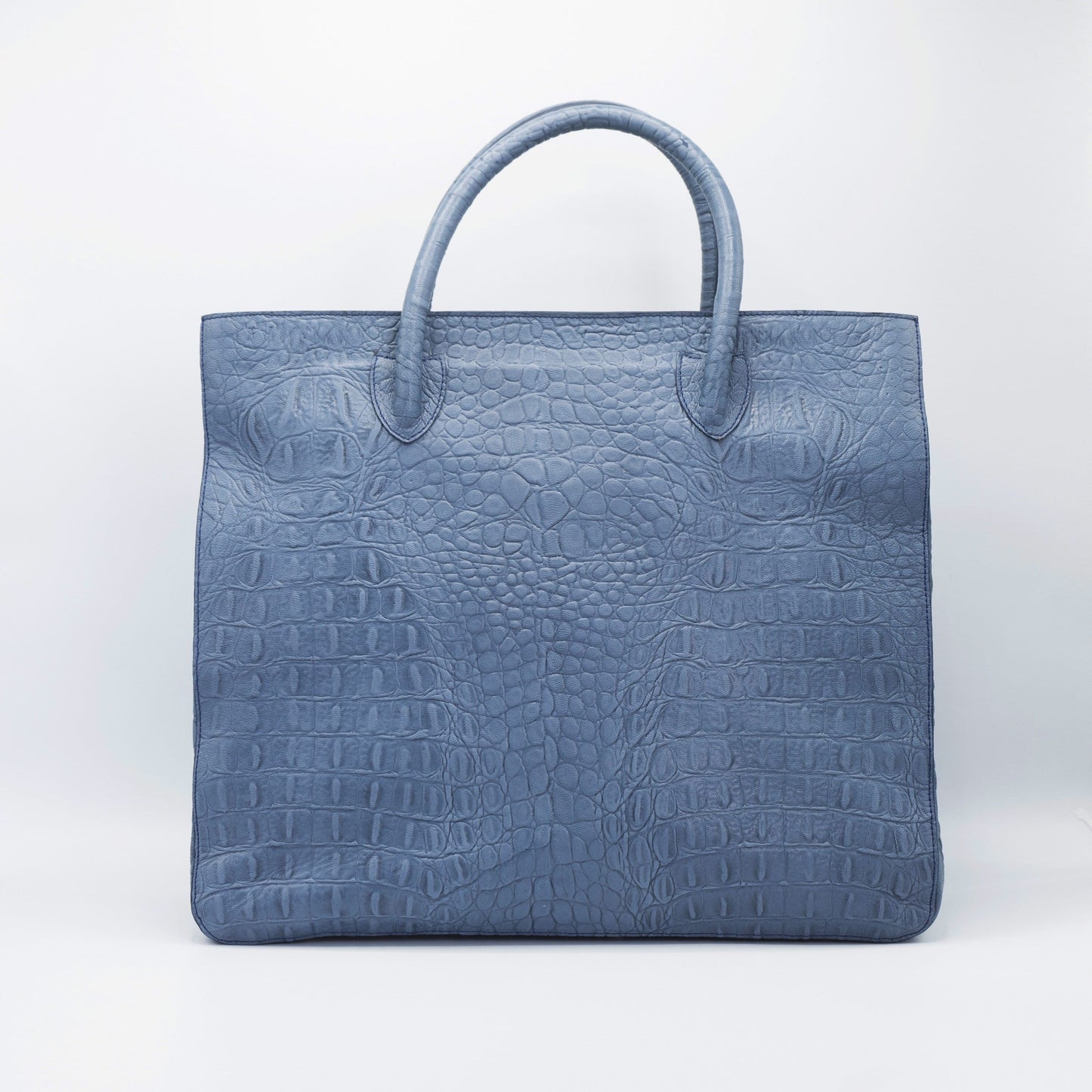 Gray Crossbody bag. Handcrafted in crocodile embossed Turkish leather, protective feet, with leather trimmed internal pockets.