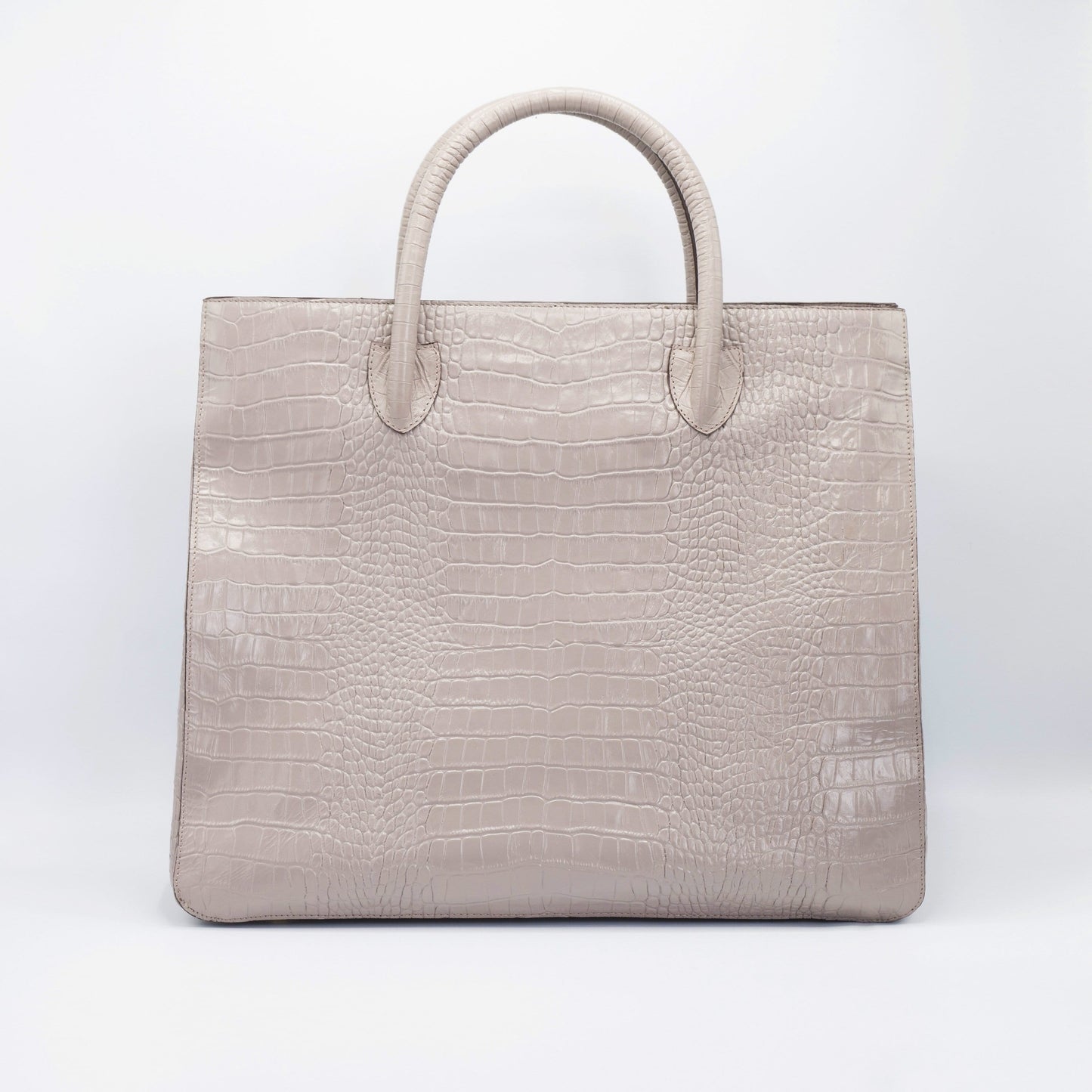 Tan Crossbody bag. Handcrafted in crocodile embossed Turkish leather, protective feet, with leather trimmed internal pockets.