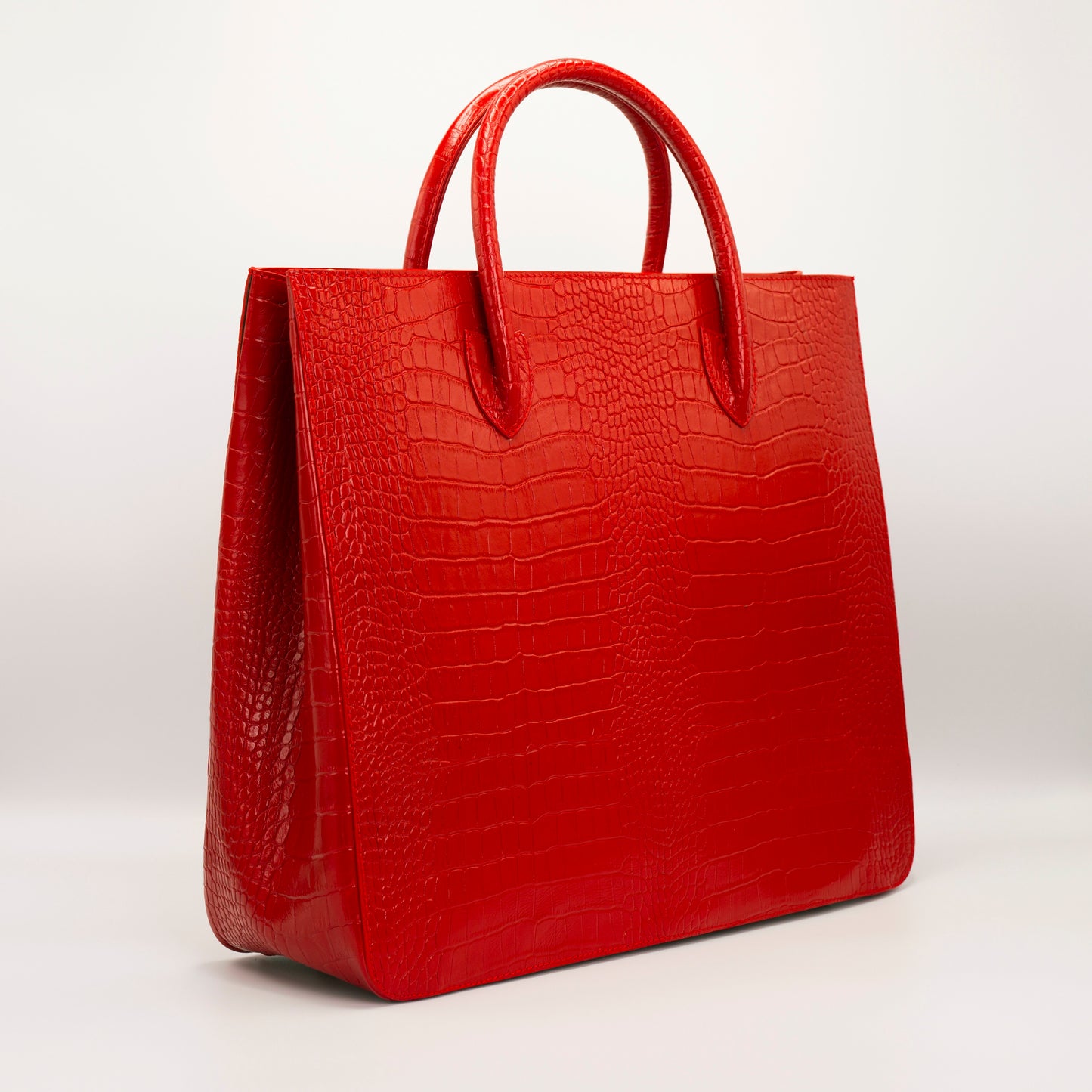 Red Crossbody bag. Handcrafted in crocodile embossed Turkish leather, protective feet, with leather trimmed internal pockets.