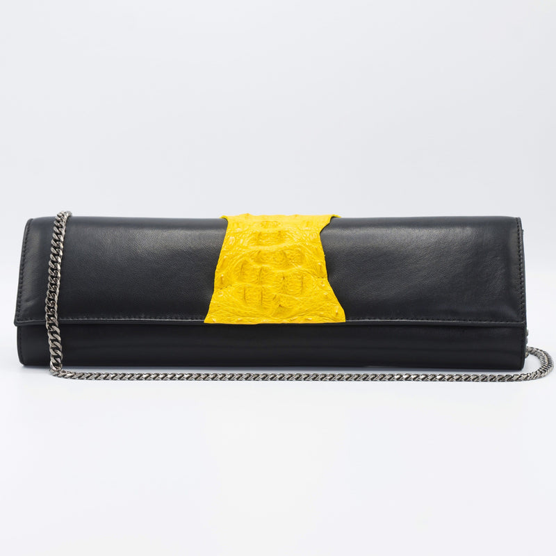 Green and Black Kate Crocodile and leather clutch. Sexy curves, sleek lines, soft materials, with bold color pallet make this an unforgettable masterpiece. Free shipping.