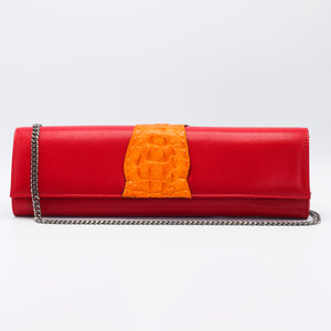 Ruby and Lava Kate Crocodile and leather clutch. Sexy curves, sleek lines, soft materials, with bold color pallet make this an unforgettable masterpiece. Free shipping.