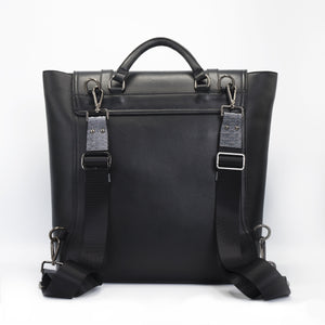 Unisex black backpack. Mens Backpack, womens backpack. Crafted in sleek Italian saffiano leather with python detail. Gregory has a modern slim profile with space for a laptop, tablet or iPad. 
