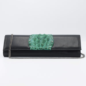 Green and Black Kate Crocodile and leather clutch. Sexy curves, sleek lines, soft materials, with bold color pallet make this an unforgettable masterpiece. Free shipping.