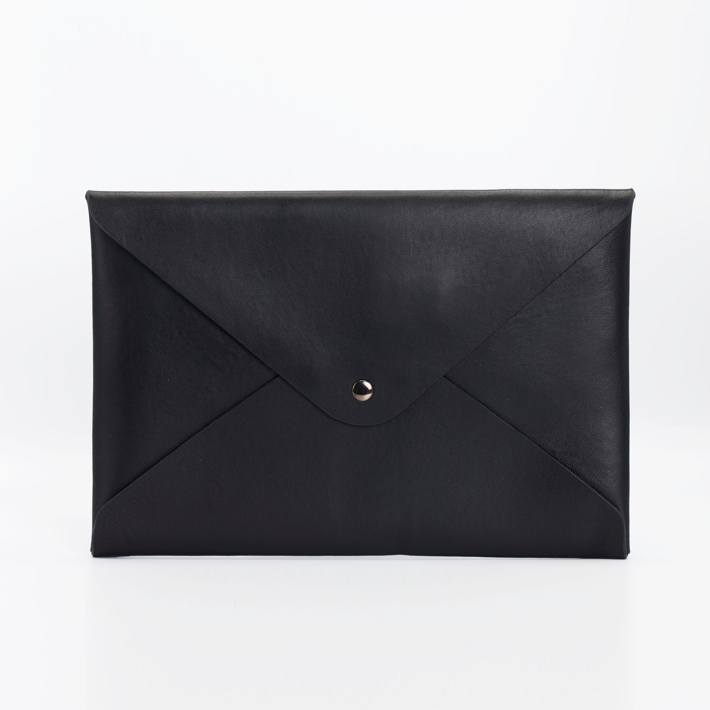 The Brody Attaché. Unisex, handcrafted, glovetanned Italian saffiano leather, Italian suede lining, snap closure, embossed logo stamp, with enough space for a tablet, iPad or other esscentials. Free shipping.