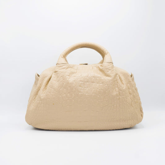 Blush sustainably sourced, crocodile embossed Turkish leather. This medium-sized handbag, tote, and messenger is expertly crafted to our exacting standards. 