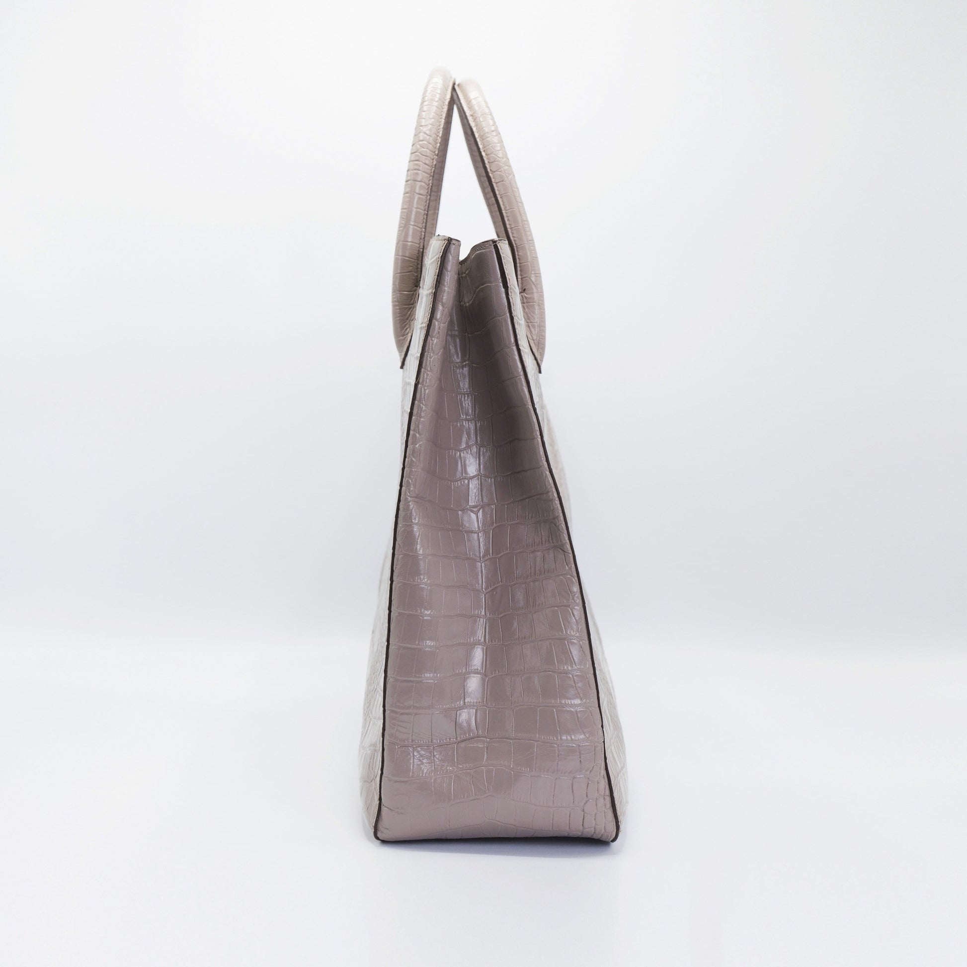 Tan Crossbody bag. Handcrafted in crocodile embossed Turkish leather, protective feet, with leather trimmed internal pockets.